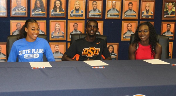 Abdi, Spencer and Hyshaw sign their National Letter of Intent